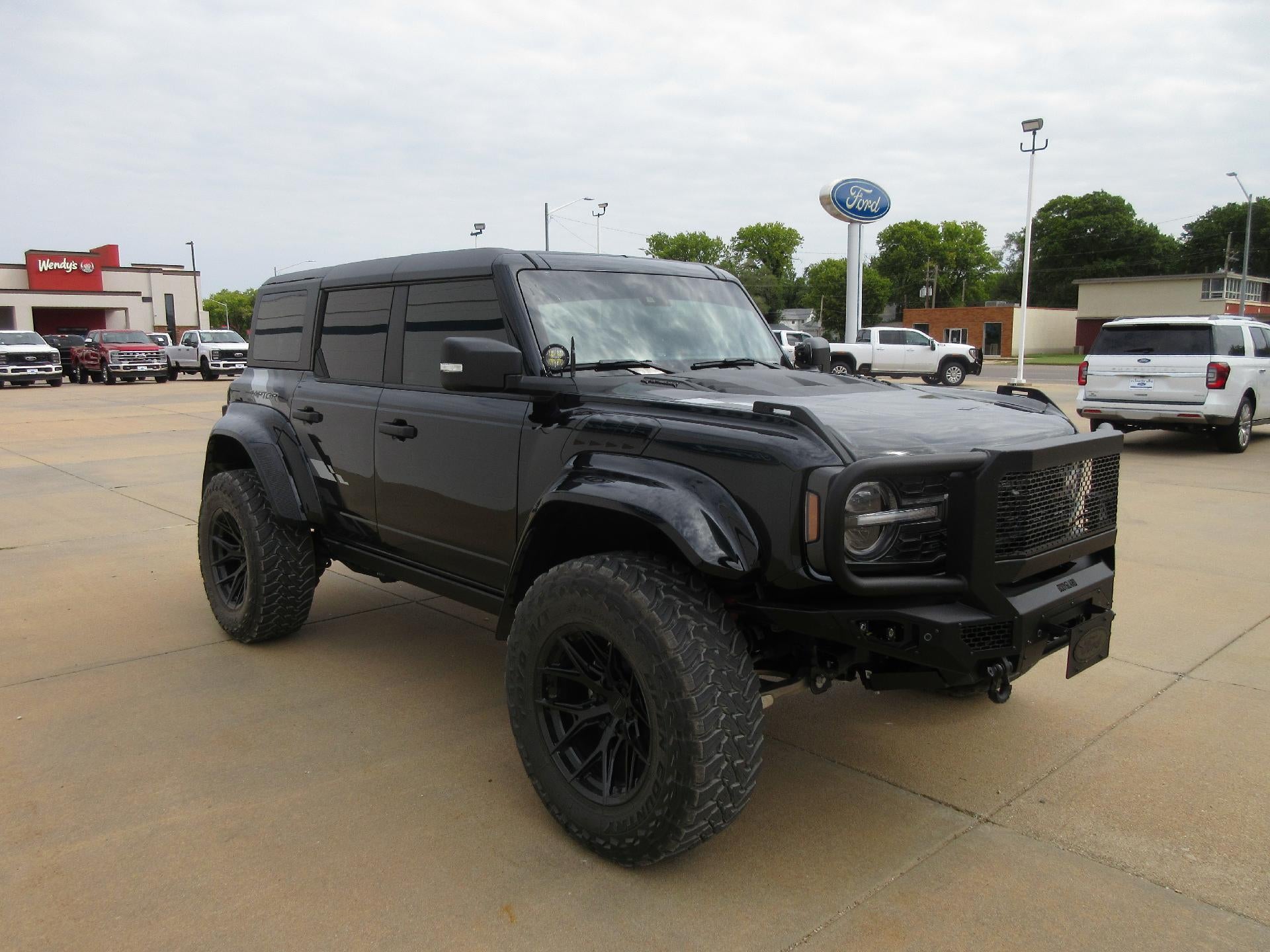 2024 Ford Bronco Raptor 4 Door Advanced 4x4 in Shadow Black — front three-quarter view