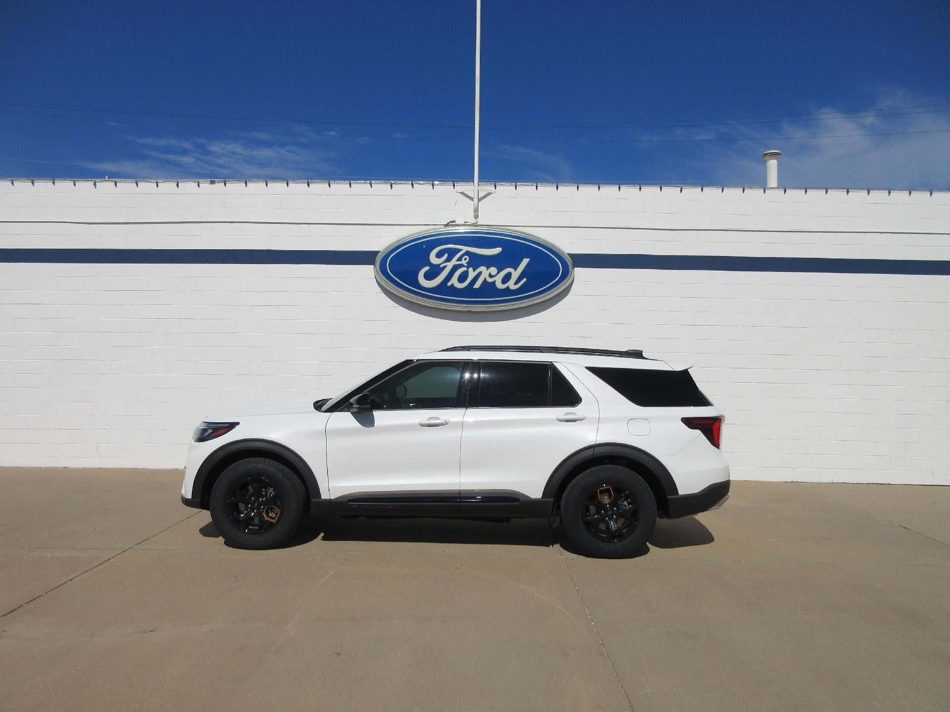 2026 Ford Explorer Tremor 4WD in Star White Metallic Tri-Coat — front three-quarter view