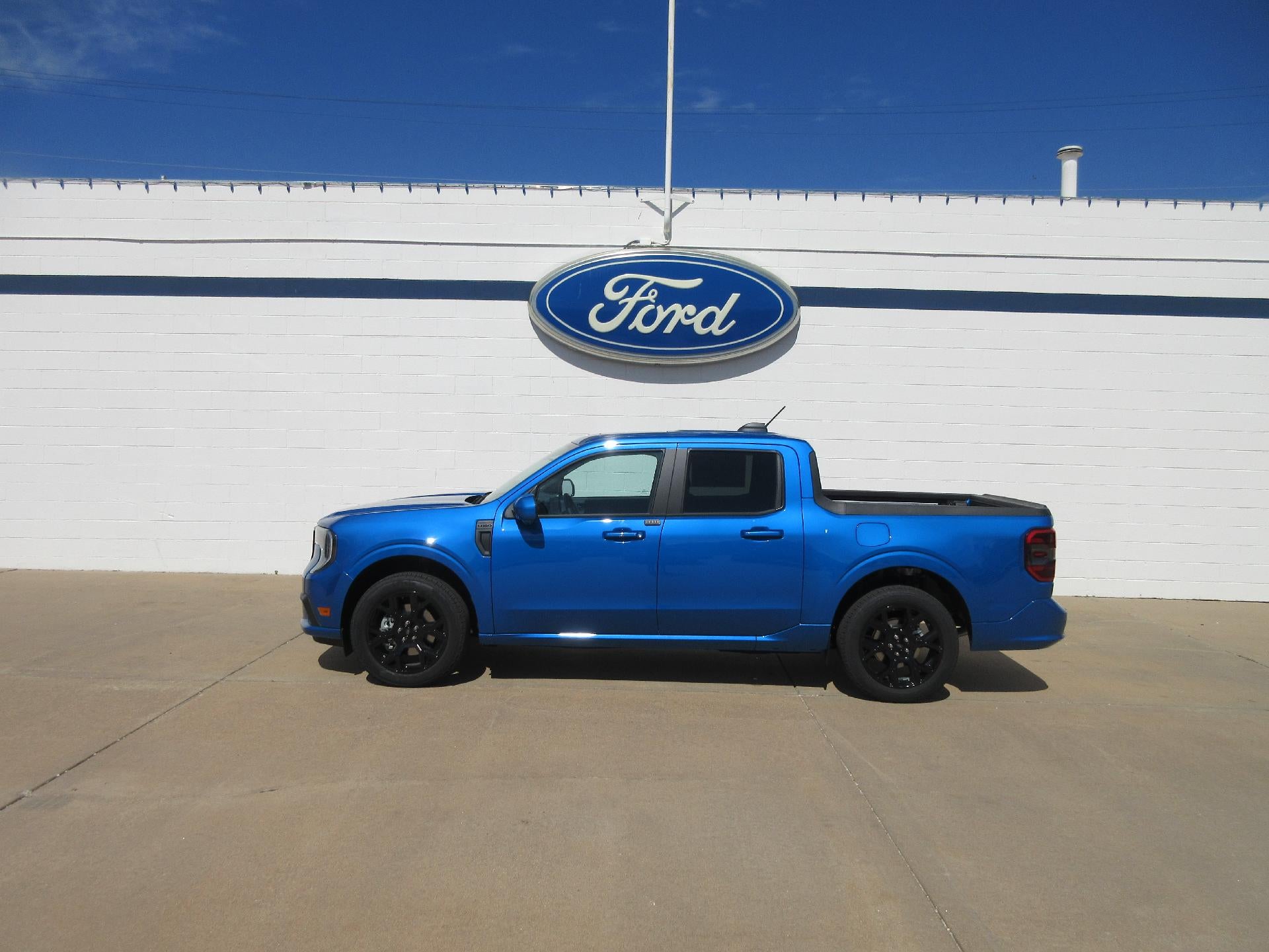 2026 Ford Maverick Lobo High AWD SuperCrew in Velocity Blue — front three-quarter view