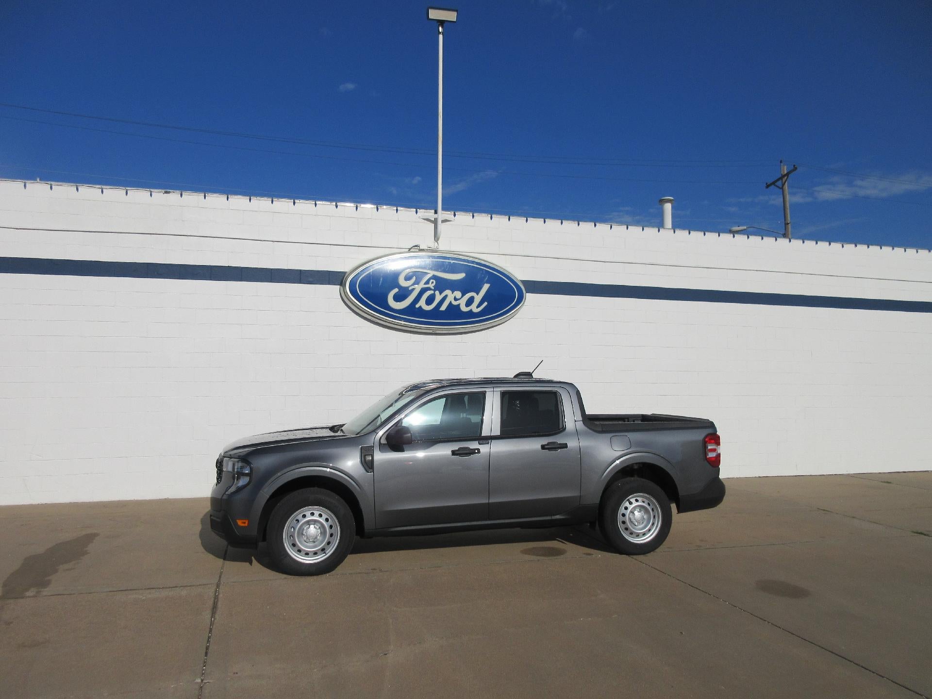 2026 Ford Maverick XL AWD SuperCrew in Carbonized Gray Metallic — front three-quarter view